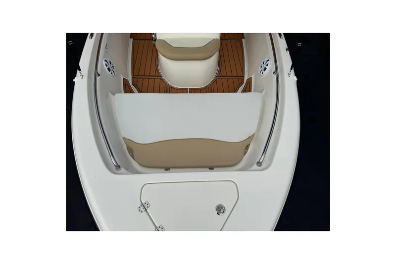 Slide: The Image of 2017 Key West 189 FS boat interior with cushioned seating and wood accents. - 102