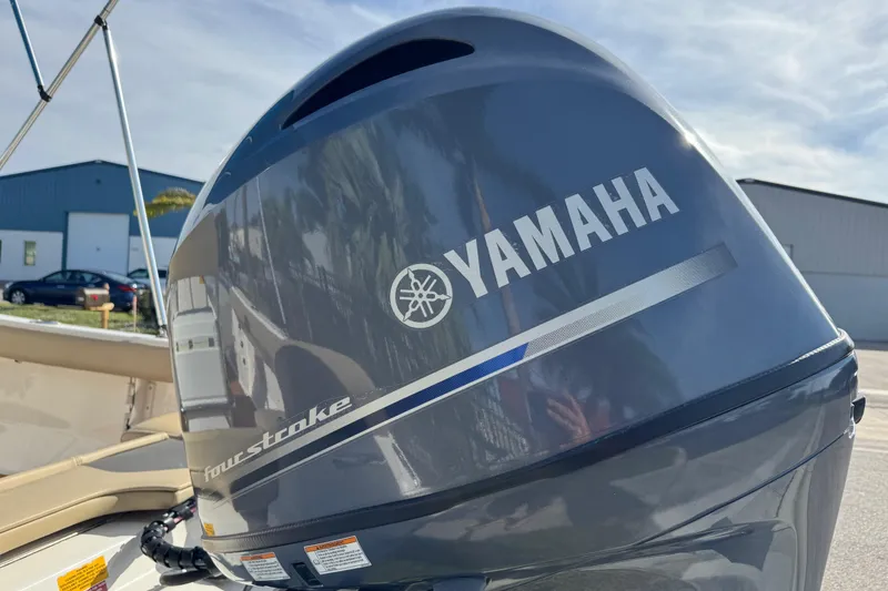 Slide: The Image of 2017 Key West 189 FS boat with Yamaha four-stroke engine in outdoor setting. - 14