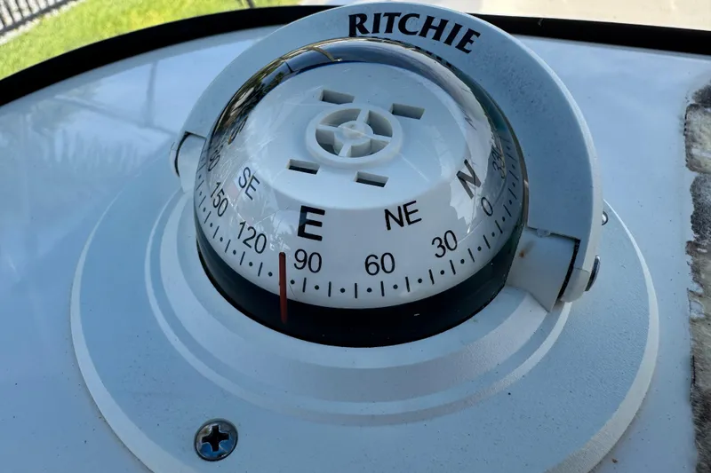 Slide: The Image of Control panel of a 2017 Key West 189 FS boat with labeled switches. - 35