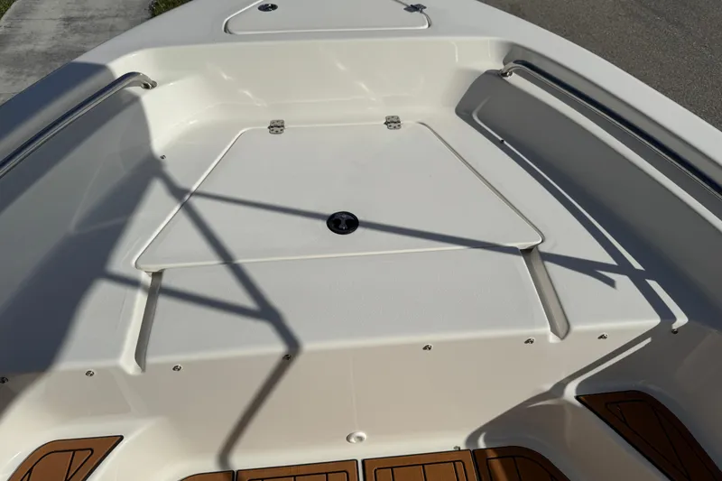 Slide: The Image of Ritchie compass on 2017 Key West 189 FS boat dashboard, showing cardinal directions. - 38