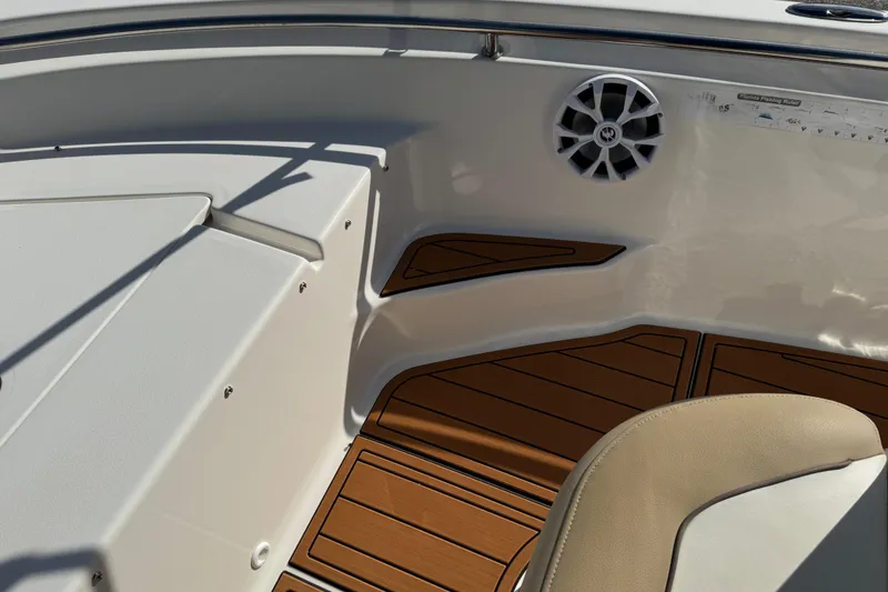 Slide: The Image of 2017 Key West 189 FS boat storage compartment with rods and wiring. - 43