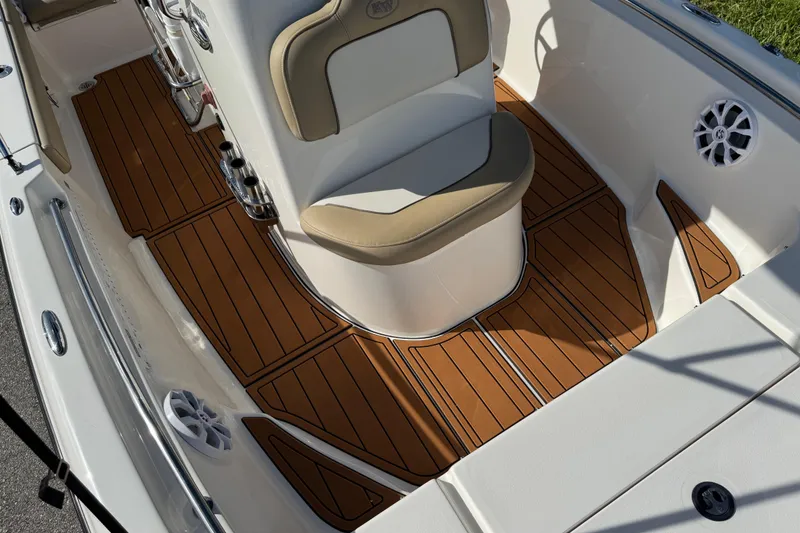 Slide: The Image of Bow storage area of a 2017 Key West 189 FS boat, featuring stainless steel rails. - 48