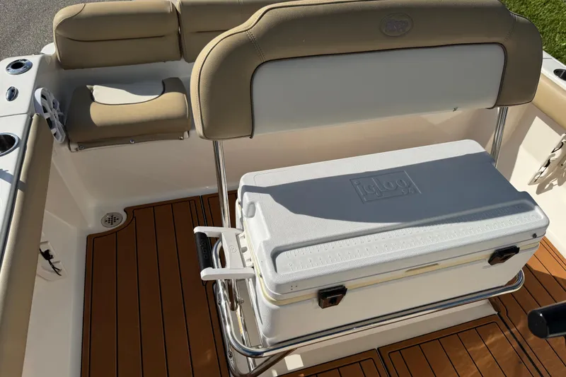Slide: The Image of 2017 Key West 189 FS boat interior with steering console and teak flooring. - 67