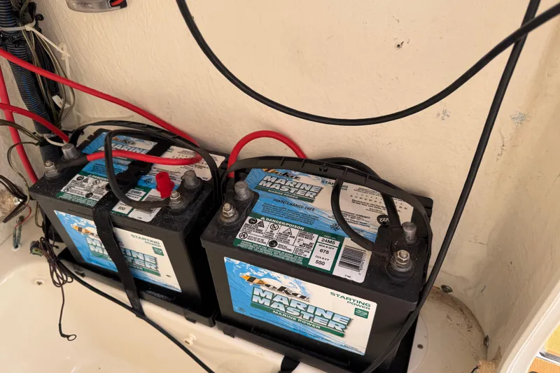 Slide: The Image of 2017 Key West 189 FS boat interior with Igloo cooler and cushioned seating. - 70