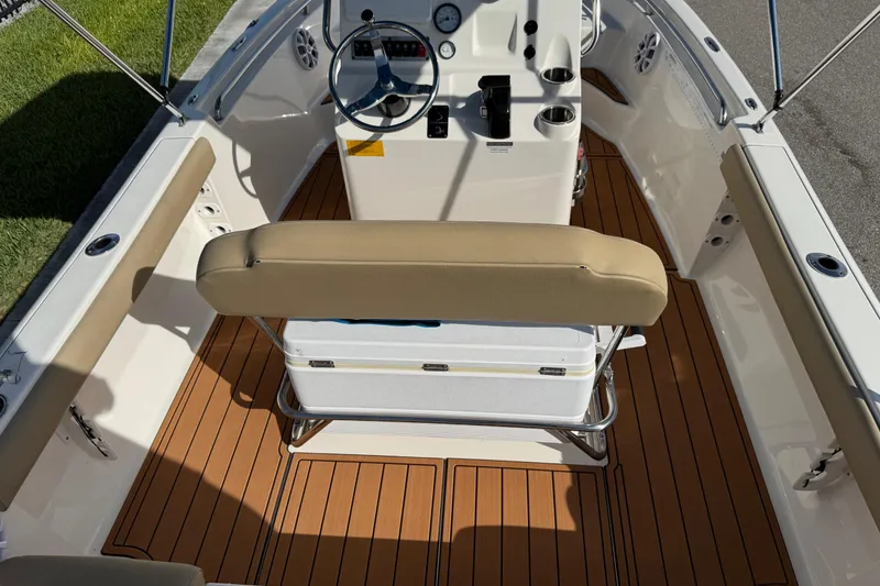 Slide: The Image of Marine batteries in a 2017 Key West 189 FS boat, connected with red and black cables. - 73