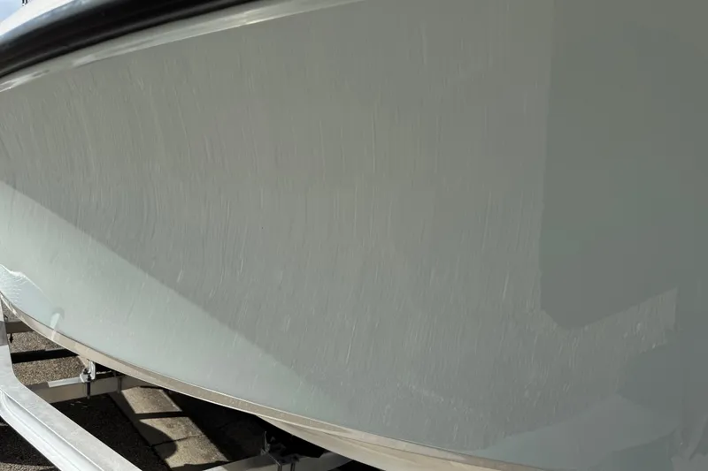 Slide: The Image of 2017 Key West 189 FS boat hull close-up on trailer. - 90