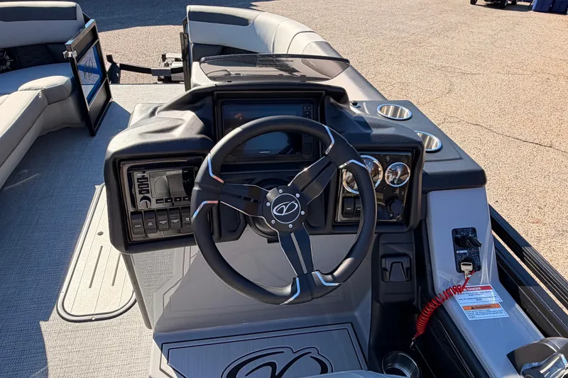 Slide: The Image of 2026 Veranda VR 235 VL boat dashboard with steering wheel and control panel. - 9