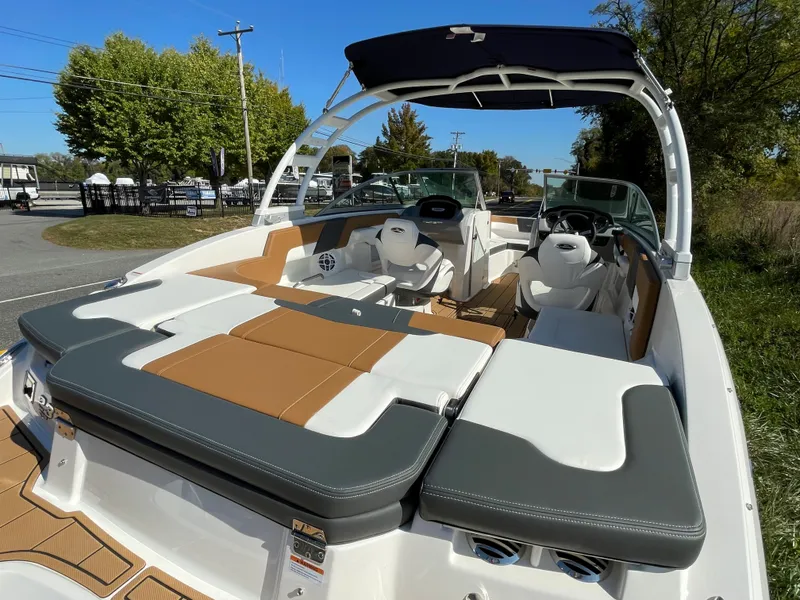 Slide: The Image of 2024 Chaparral 23 SSi OB boat with spacious seating and modern design. - 47