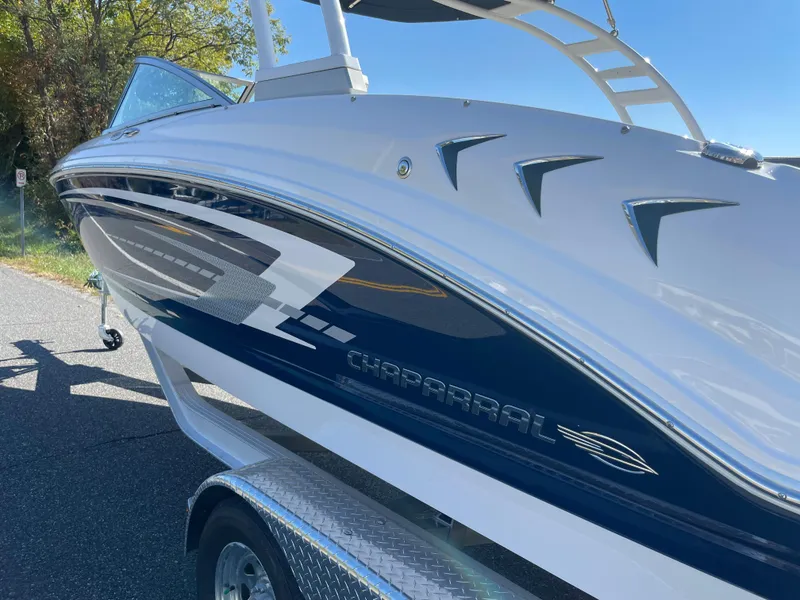 Slide: The Image of 2024 Chaparral 23 SSi OB boat on trailer, side view. - 2