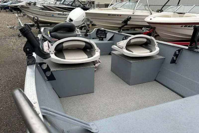 Slide: The Image of 2025 Smoker Craft 15 Alaskan Split Seat boat with dual seating and motor. - 6