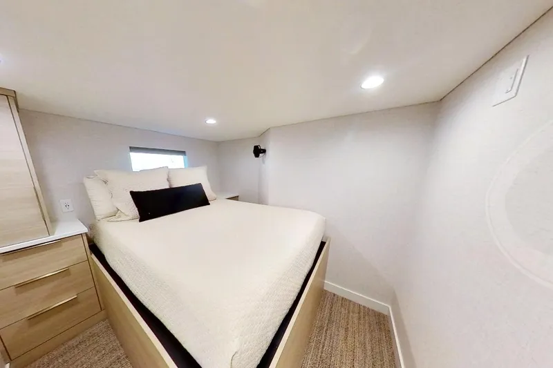 Slide: The Image of Compact bedroom in Adonia Radiance Share #3, 2022 model, featuring cozy bed and modern lighting. - 15