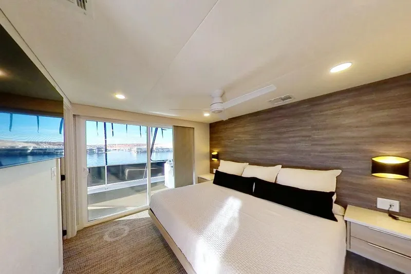 Slide: The Image of Luxurious bedroom in Adonia Radiance Share #3 houseboat, featuring modern decor and waterfront view. - 29