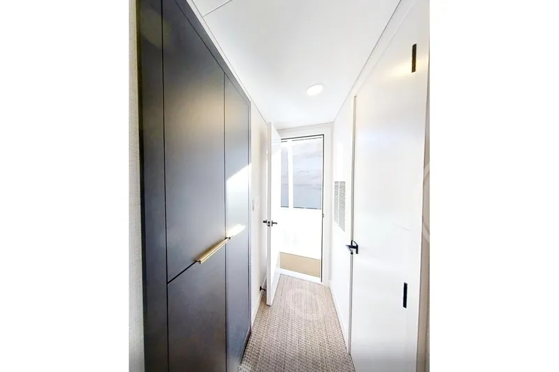 Slide: The Image of Narrow hallway in Adonia Radiance Share #3, 2022 model, featuring modern design and ample lighting. - 32