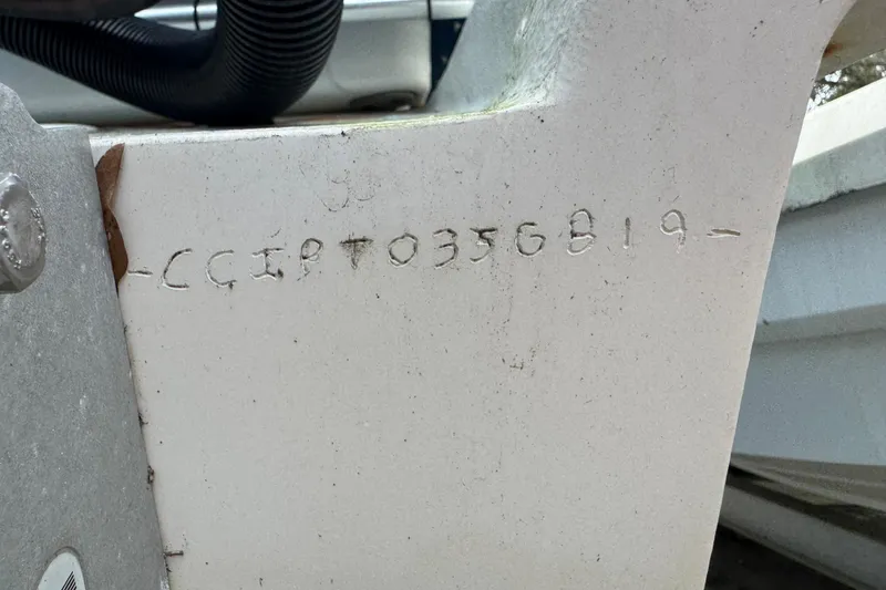 Slide: The Image of Hull identification number on a 1999 Catamaran Coaches 31 boat. - 20