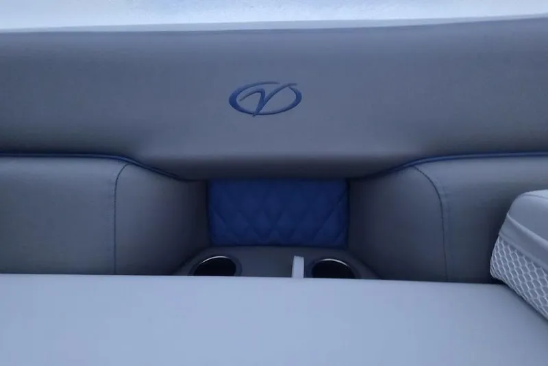 Slide: The Image of 2026 Veranda Vista 22RC boat interior with logo and cup holders. - 13