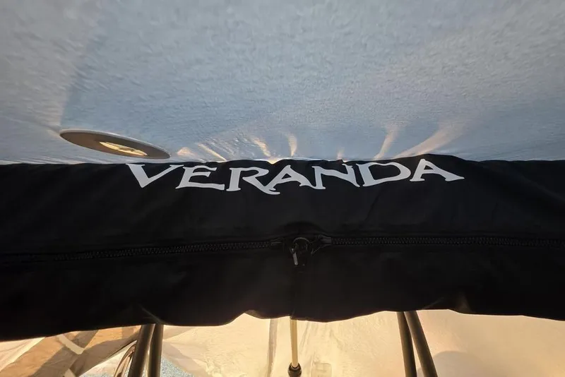 Slide: The Image of Veranda Vista 22RC 2026 model, showcasing brand logo on a black cover. - 24