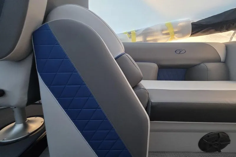 Slide: The Image of 2026 Veranda Vista 22RC interior with blue and gray seating, showcasing modern design. - 25