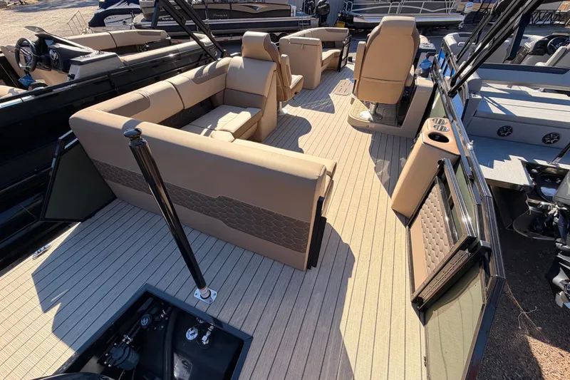 Slide: The Image of 2026 Veranda VR 235 L pontoon boat interior with beige seating and modern design. - 17