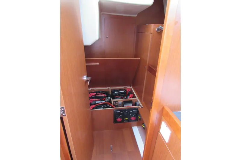 Slide: The Image of 2017 Beneteau Oceanis 41.1 yacht interior with open battery compartment. - 17