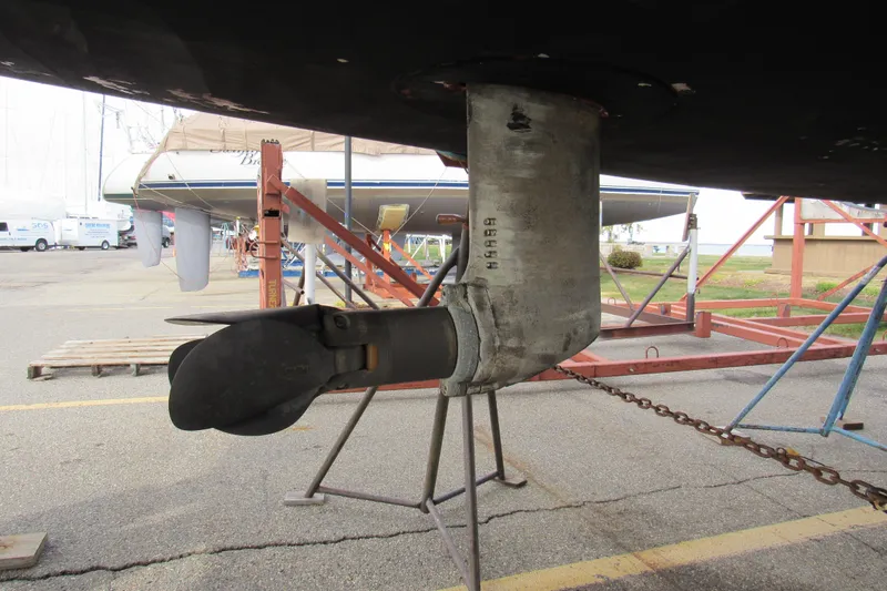 Slide: The Image of Close-up of a 2017 Beneteau Oceanis 41.1 sailboat propeller and rudder on a stand. - 28