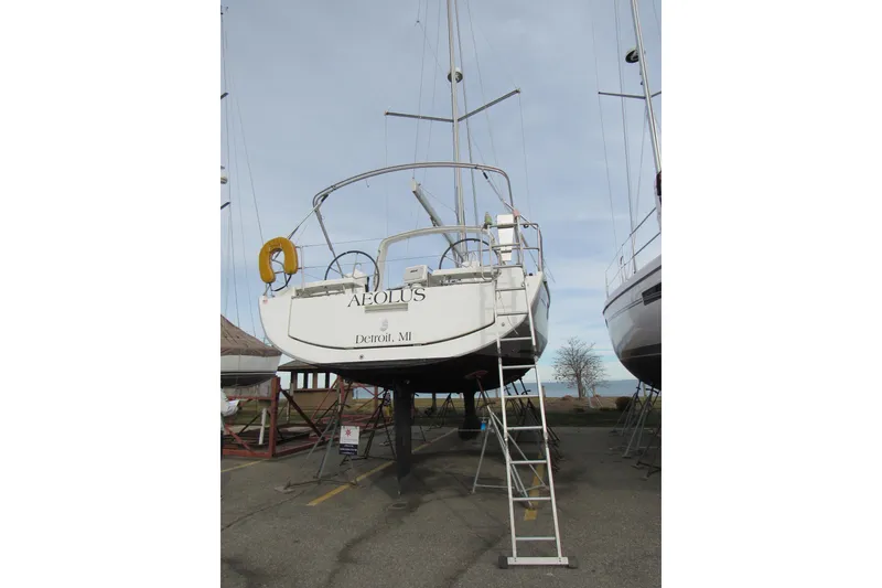 Slide: The Image of 2017 Beneteau Oceanis 41.1 sailboat on dry dock with ladder access. - 30