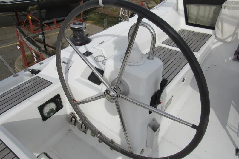 Slide: The Image of 2017 Beneteau Oceanis 41.1 yacht steering wheel and cockpit controls. - 32
