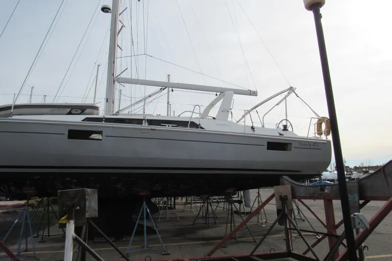 Slide: The Image of 2017 Beneteau Oceanis 41.1 sailboat on dry dock, side view. - 4