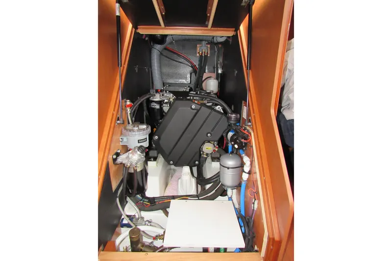 Slide: The Image of Engine compartment of 2017 Beneteau Oceanis 41.1 sailboat, showcasing mechanical components. - 43