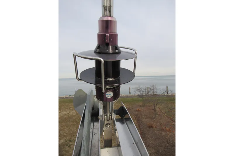 Slide: The Image of Furling system on a 2017 Beneteau Oceanis 41.1 sailboat, near a coastal landscape. - 53