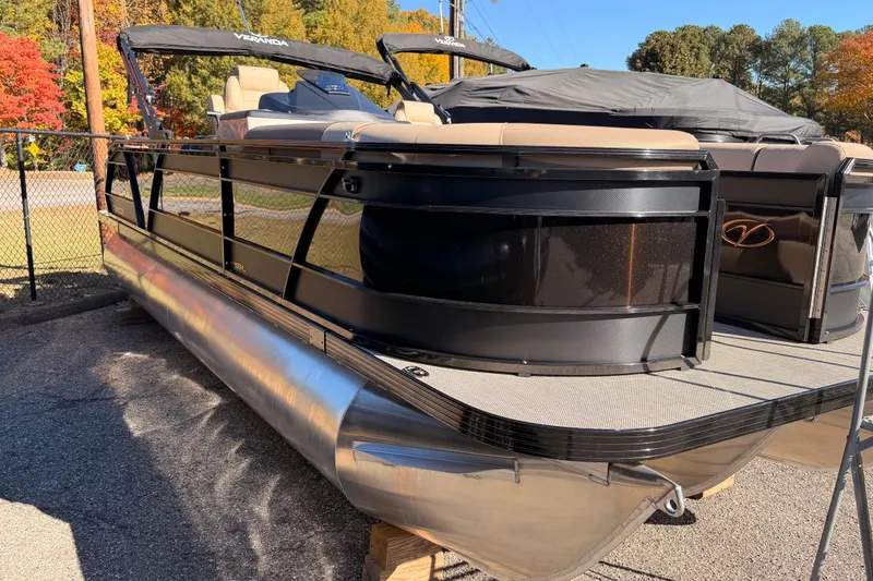 Slide: The Image of 2026 Veranda VR235VL pontoon boat with sleek black design and comfortable seating. - 3