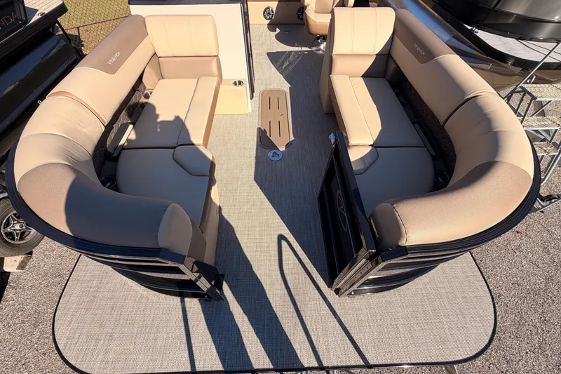 Slide: The Image of 2026 Veranda VR235VL pontoon boat with beige seating and spacious deck layout. - 4