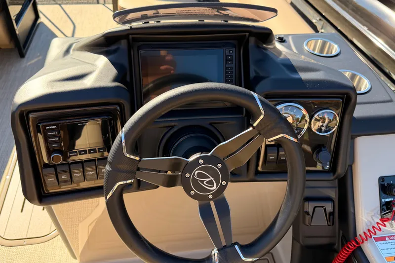 Slide: The Image of Steering console of 2026 Veranda VR235VL boat with modern controls and gauges. - 9