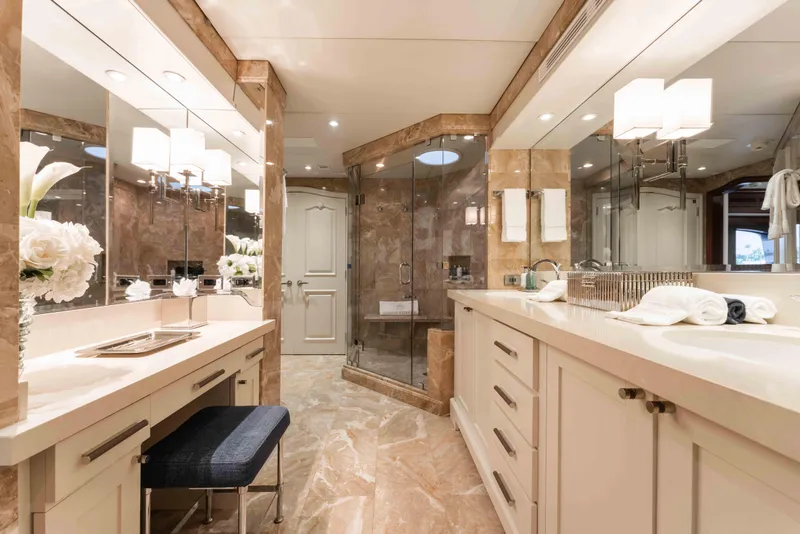 Slide: The Image of Luxurious bathroom on 2004 Trinity Yachts motor yacht, featuring elegant marble and modern fixtures. - 10
