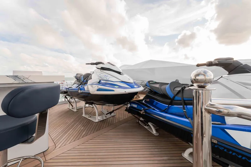 Slide: The Image of Luxury motor yacht deck with jet skis, Trinity Yachts 2004 model. - 31
