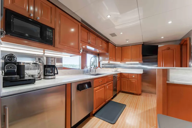 Slide: The Image of Luxurious kitchen interior of 2004 Trinity Yachts motor yacht with modern appliances. - 36