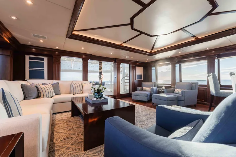 Slide: The Image of Luxurious interior of 2004 Trinity Yachts motor yacht with elegant seating and ocean views. - 23