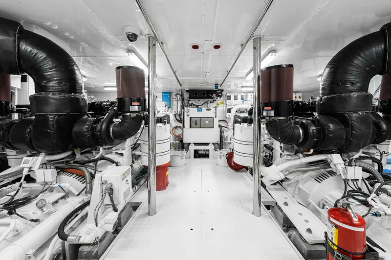 Slide: The Image of Engine room of 2004 Trinity Yachts Motor Yacht, featuring advanced machinery and equipment. - 41