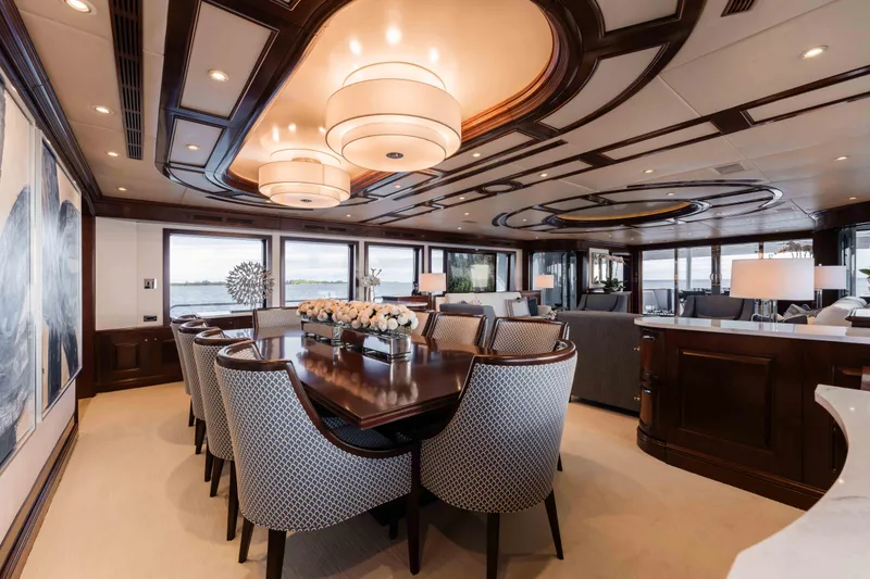 Slide: The Image of Luxurious interior of 2004 Trinity Yachts motor yacht with elegant dining area and modern decor. - 6