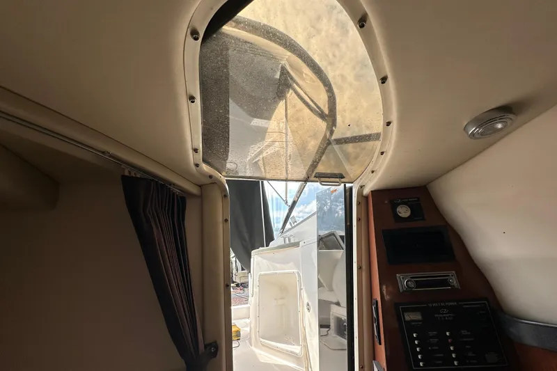 Slide: The Image of Interior view of 2006 Regal Commodore 2665 boat cabin with open hatch. - 14