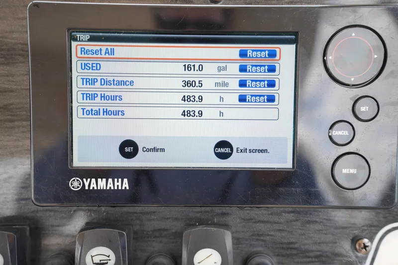 Slide: The Image of Yamaha boat display showing trip data: 161 gallons used, 360.5 miles, 483.9 hours. Grady-White Freedom 225. - 24