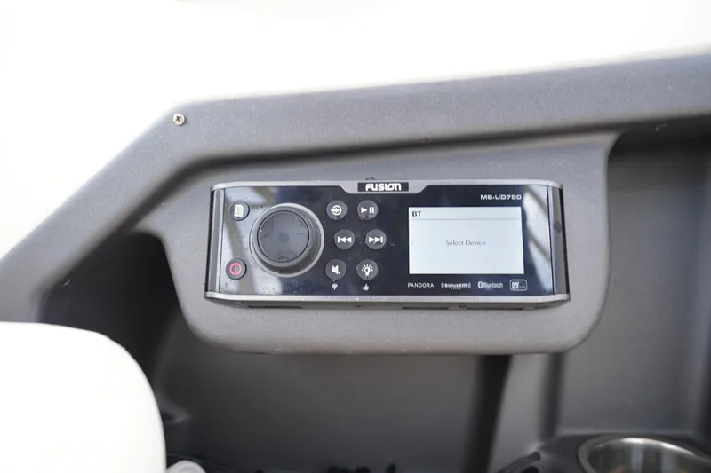 Slide: The Image of Fusion marine stereo system on 2016 Grady-White Freedom 225 boat dashboard. - 28