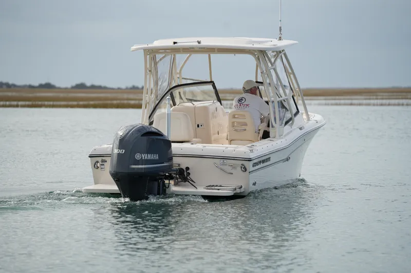 Slide: The Image of 2016 Grady-White Freedom 225 boat with Yamaha engine on calm water. - 4