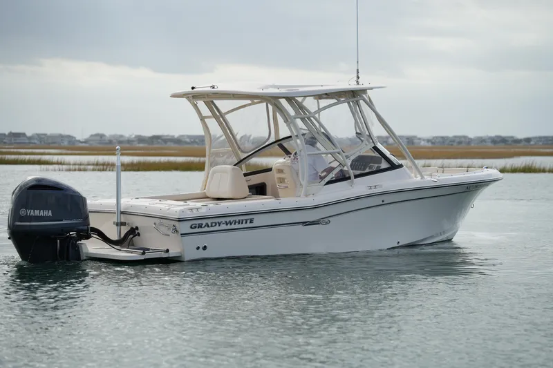 Slide: The Image of 2016 Grady-White Freedom 225 boat with Yamaha engine on calm water. - 8