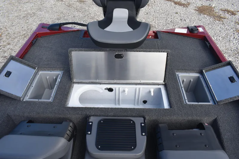 Slide: The Image of 2026 Lowe Stinger 175C boat interior with storage compartments and seating. - 16