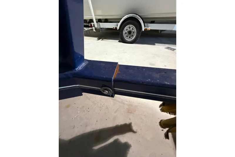 Slide: The Image of Close-up of a 1999 Four Winns 220 Horizon boat trailer hitch. - 14