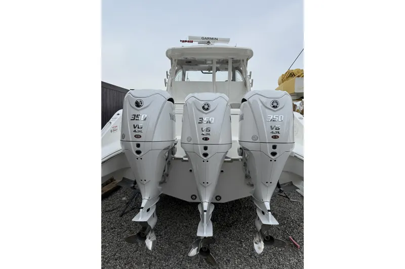 Slide: The Image of 2026 Pursuit OS 355 Offshore boat with triple Yamaha 350 V6 engines. - 3