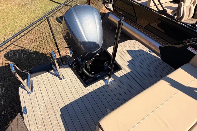 Slide: The Image of 2026 Veranda VR 265 VL Blackout Edition boat with motor and ladder on deck. - 14
