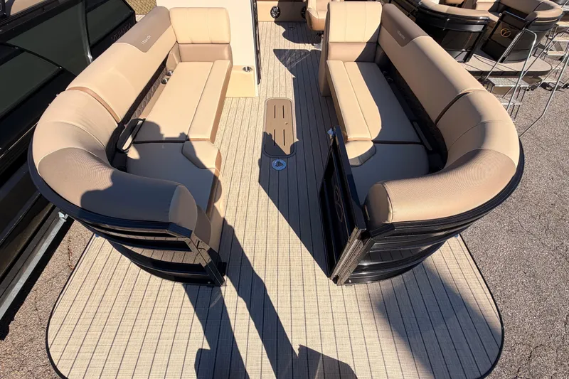 Slide: The Image of 2026 Veranda VR 265 VL Blackout Edition pontoon boat with beige seating and sleek design. - 5