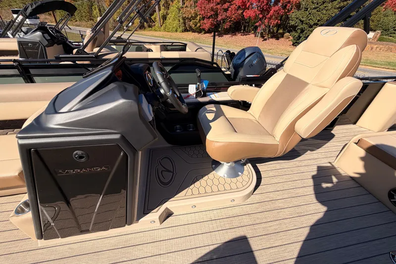 Slide: The Image of Luxurious helm seat of 2026 Veranda VR 265 VL Blackout Edition pontoon boat. - 9