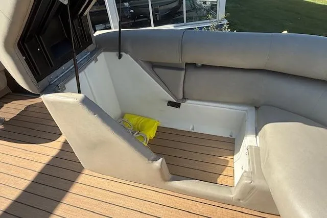 Slide: The Image of 2019 Premier 260 Grand Entertainer boat interior storage compartment with seating. - 15
